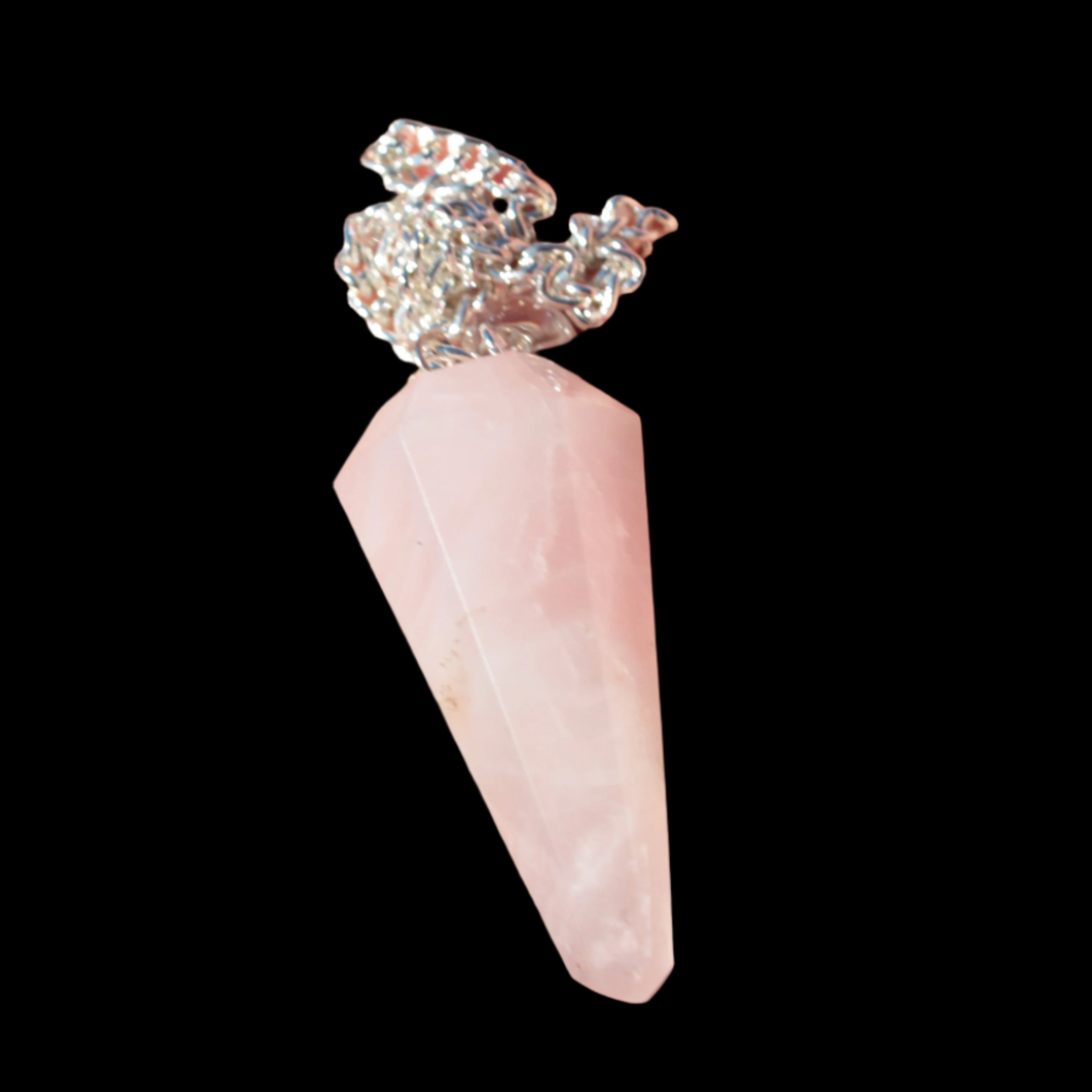 Rose Quartz faceted cone dowsing pendulum 34mm 9g in sunlight - Rocks and Things Store