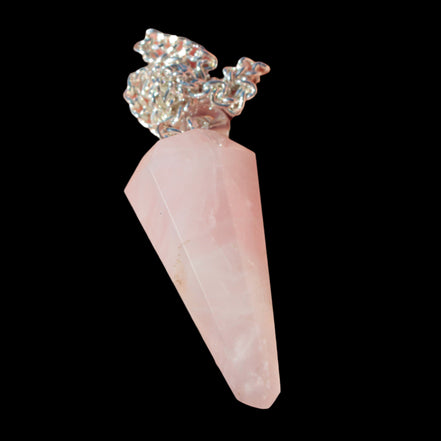 Rose Quartz faceted cone dowsing pendulum 34mm 9g in sunlight - Rocks and Things Store