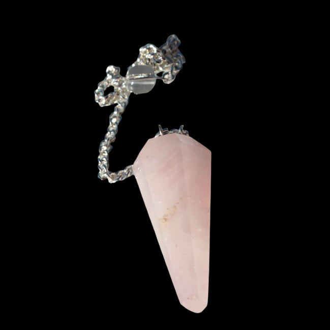Rose Quartz faceted cone dowsing pendulum 34mm 9g in sunlight - Rocks and Things Store