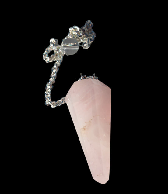 Rose Quartz faceted cone dowsing pendulum 34mm 9g in sunlight - Rocks and Things Store