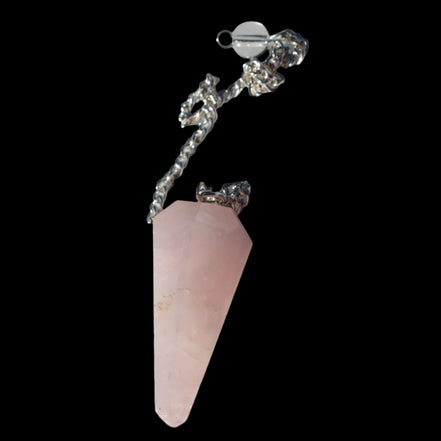 Rose Quartz faceted cone dowsing pendulum 34mm 9g in sunlight - Rocks and Things Store