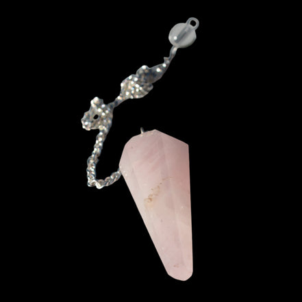 Rose Quartz faceted cone dowsing pendulum 34mm 9g in sunlight - Rocks and Things Store