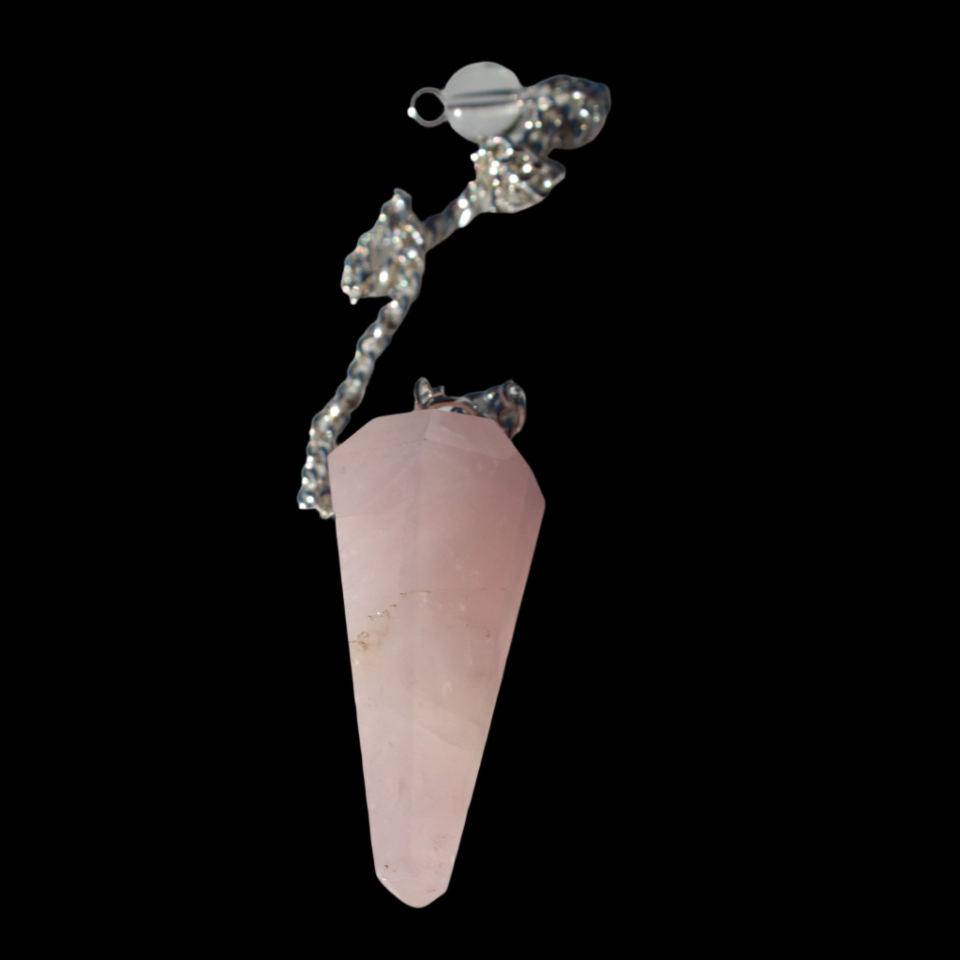 Rose Quartz faceted cone dowsing pendulum 34mm 9g in sunlight - Rocks and Things Store