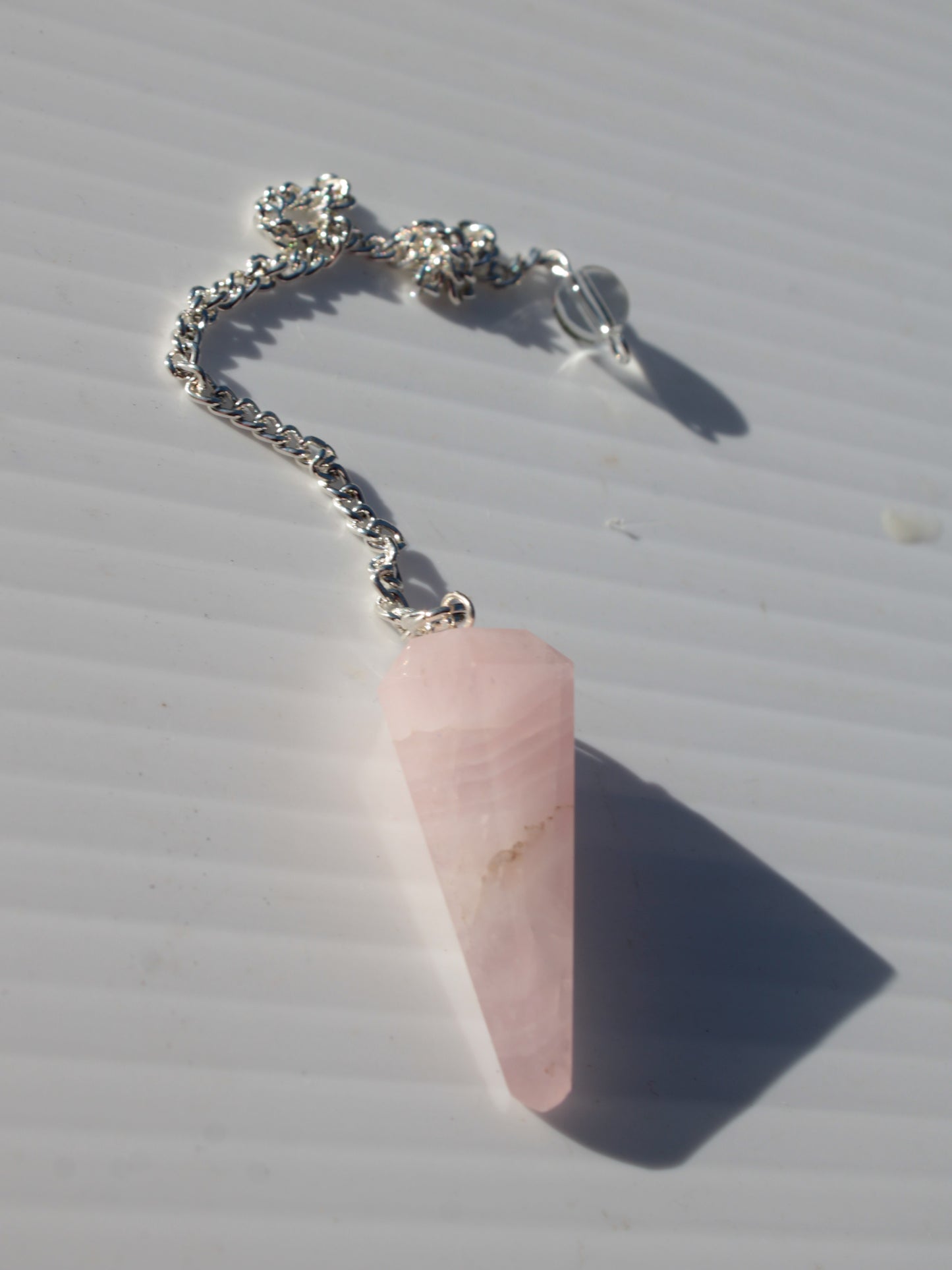 Rose Quartz faceted cone dowsing pendulum 34mm 9g Rocks and Things