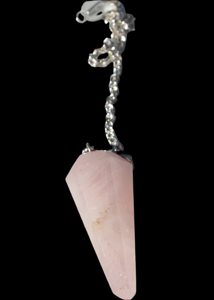 Rose Quartz faceted cone dowsing pendulum 34mm 9g in sunlight - Rocks and Things Store