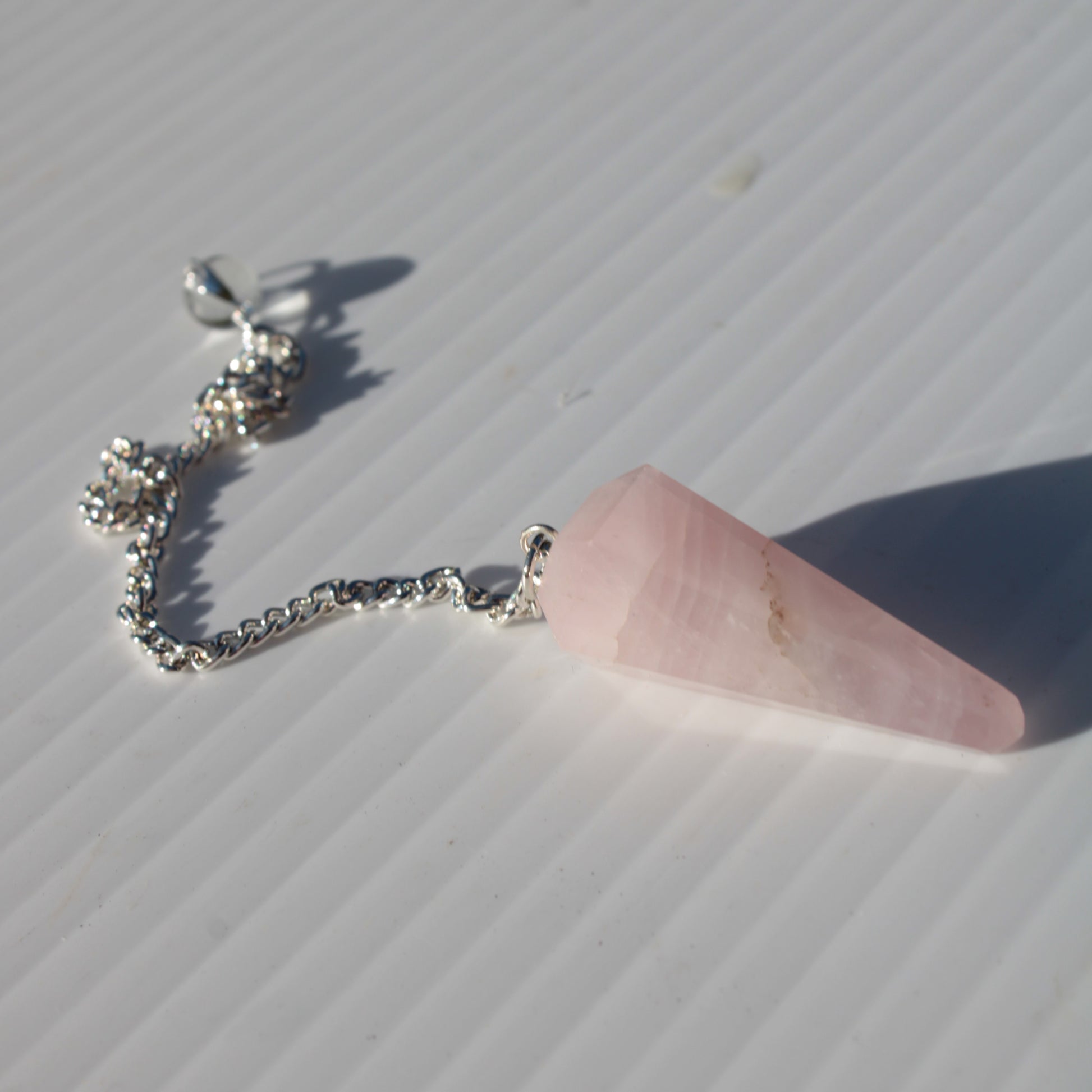 Rose Quartz faceted cone dowsing pendulum 34mm 9g Rocks and Things