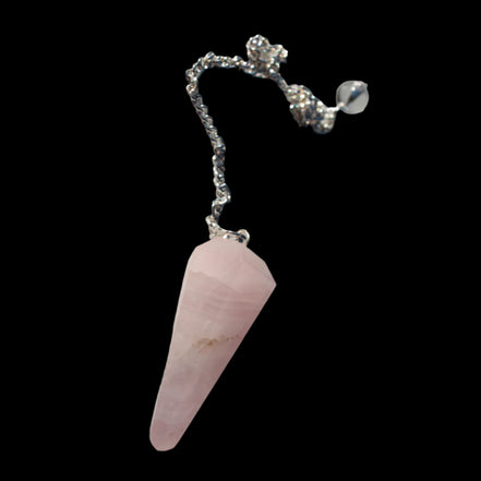 Rose Quartz faceted cone dowsing pendulum 34mm 9g in sunlight - Rocks and Things Store