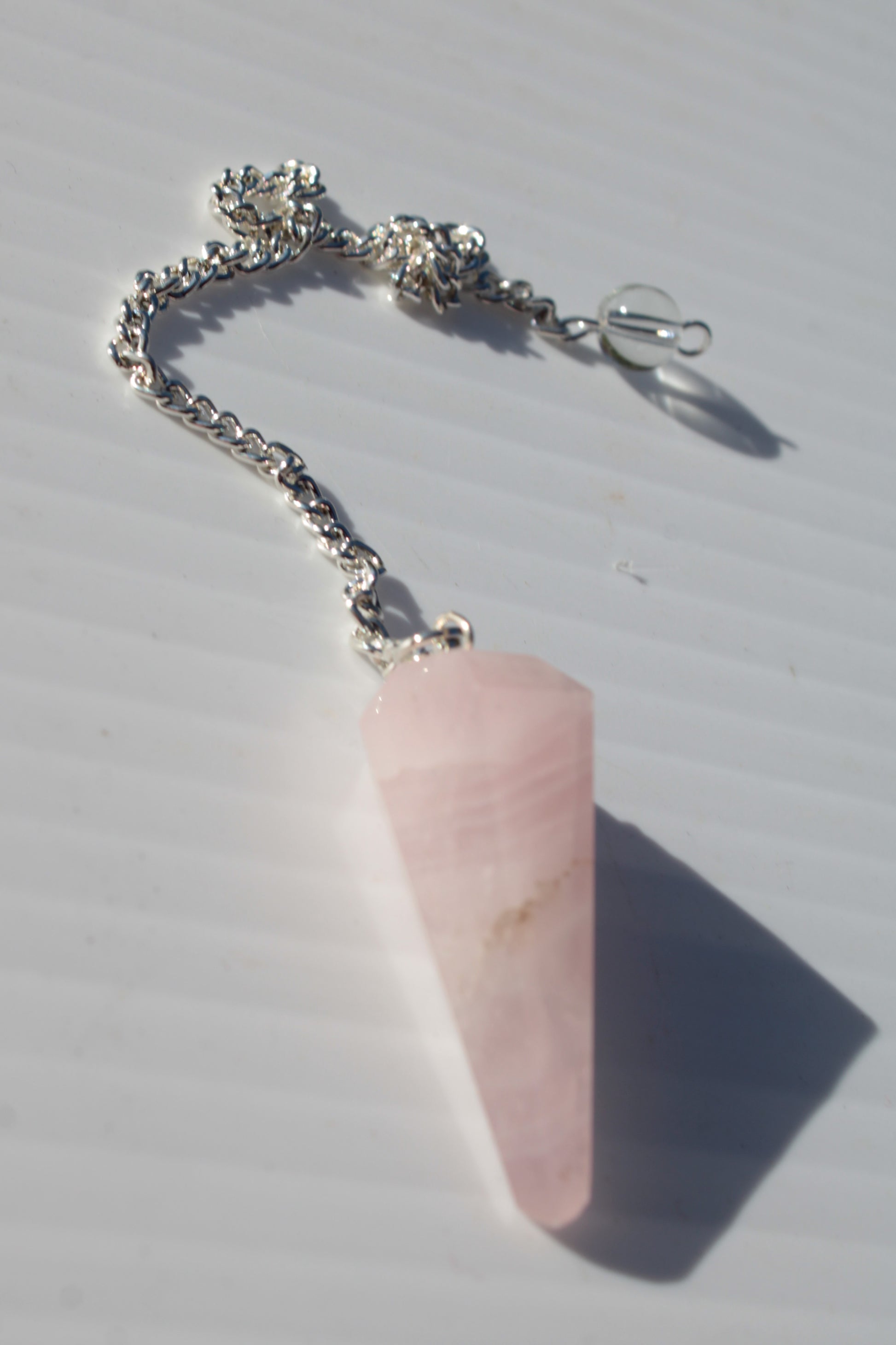 Rose Quartz faceted cone dowsing pendulum 34mm 9g Rocks and Things