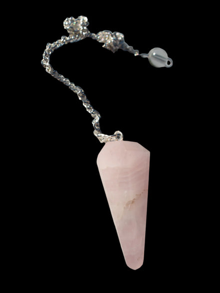 Rose Quartz faceted cone dowsing pendulum 34mm 9g in sunlight - Rocks and Things Store