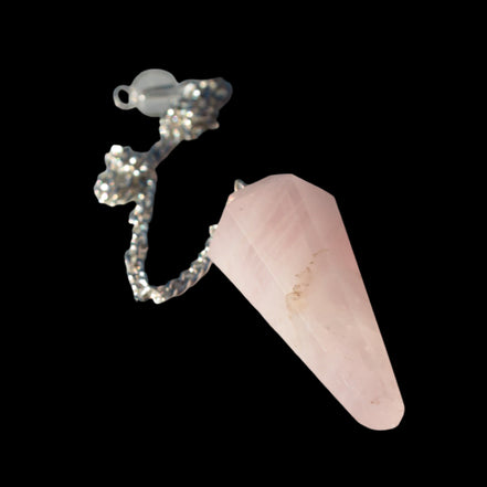 Rose Quartz faceted cone dowsing pendulum 34mm 9g in sunlight - Rocks and Things Store