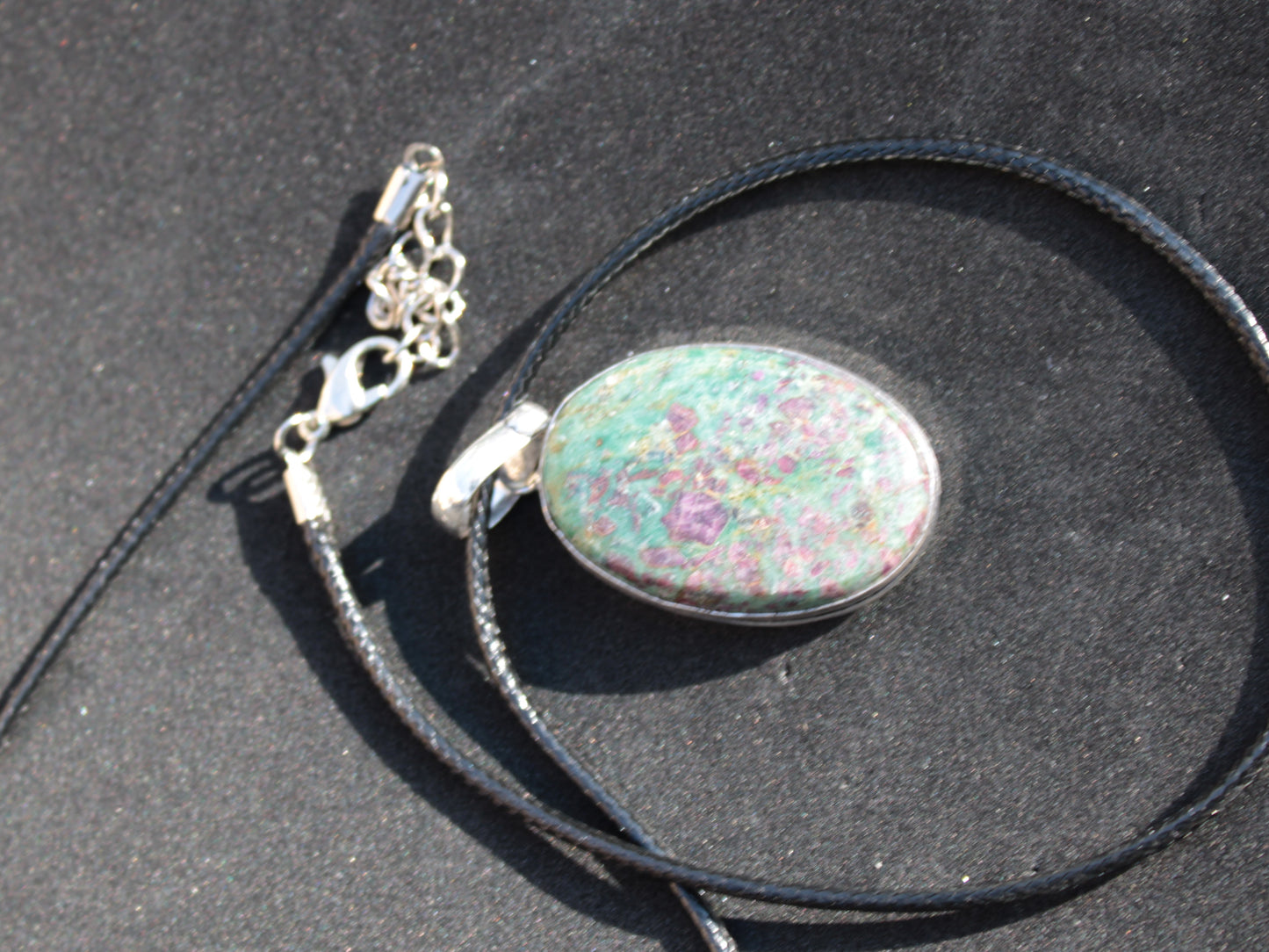 Ruby Fuchsite 925 Silver Plated pendant with black strap 14.9g Rocks and Things