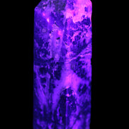 Purple Fantasy Fluorite obelisk 369g in UV light