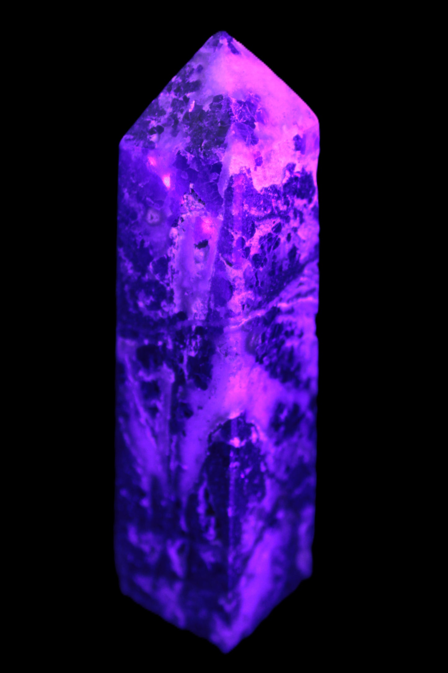 Purple Fantasy Fluorite obelisk 369g in UV light