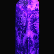 Purple Fantasy Fluorite obelisk 369g in UV light