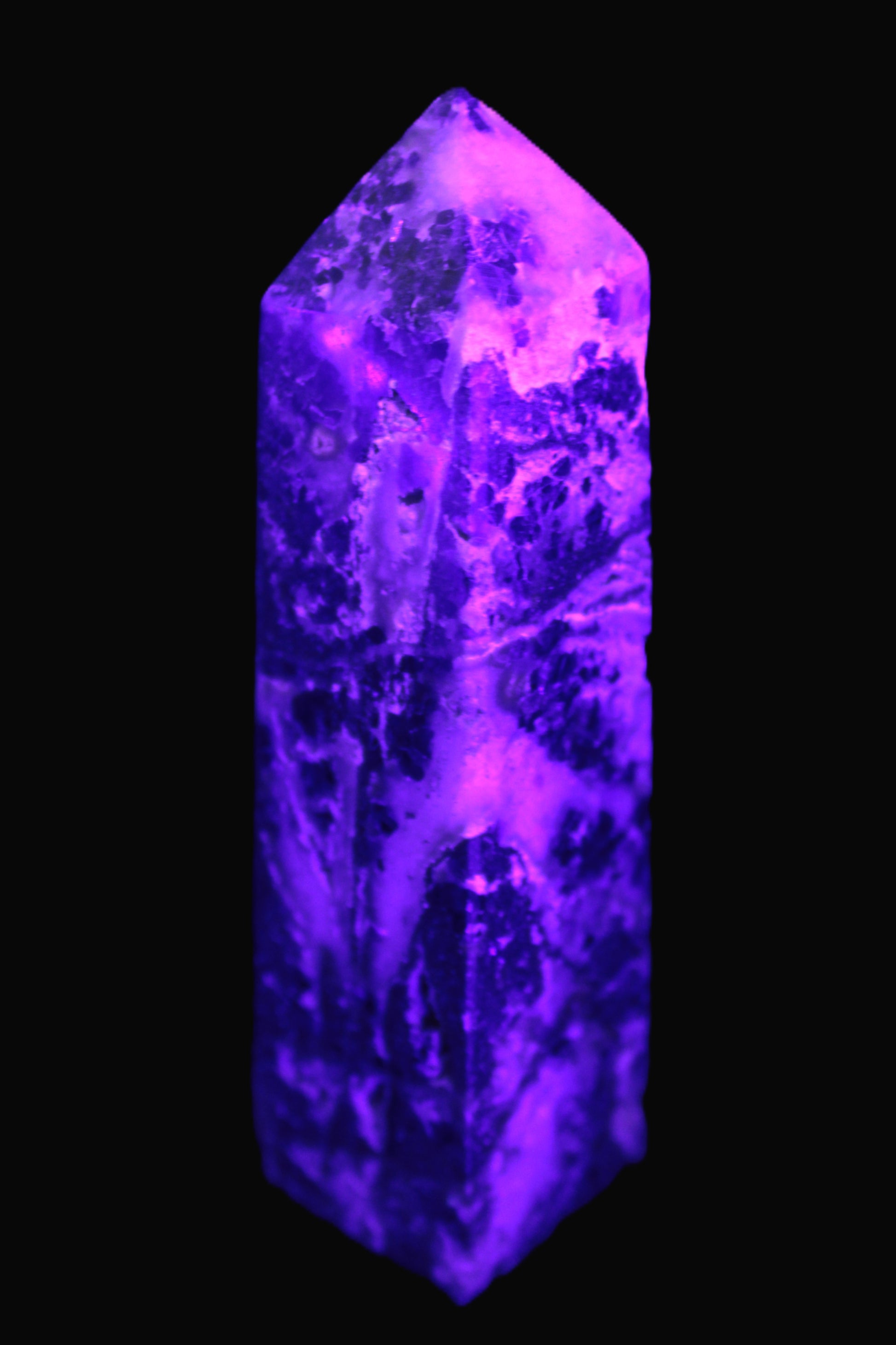 Purple Fantasy Fluorite obelisk 369g in UV light