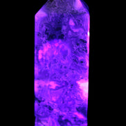 Purple Fantasy Fluorite obelisk 369g in UV light