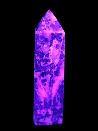 Purple Fantasy Fluorite obelisk 369g in UV light