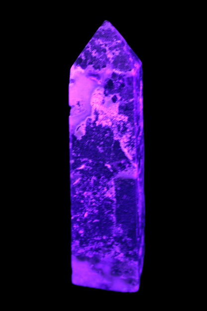 Purple Fantasy Fluorite obelisk 369g in UV light