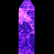 Purple Fantasy Fluorite obelisk 369g in UV light