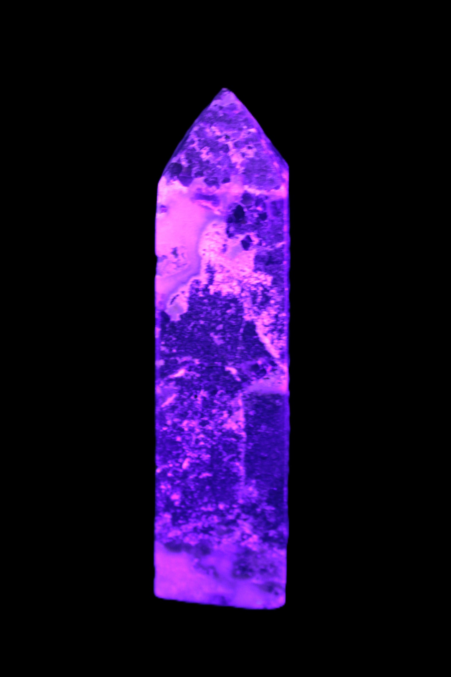 Purple Fantasy Fluorite obelisk 369g in UV light