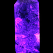 Purple Fantasy Fluorite obelisk 369g in UV light