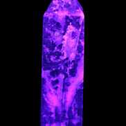 Purple Fantasy Fluorite obelisk 369g in UV light