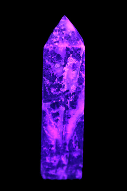 Purple Fantasy Fluorite obelisk 369g in UV light