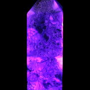 Purple Fantasy Fluorite obelisk 369g in UV light
