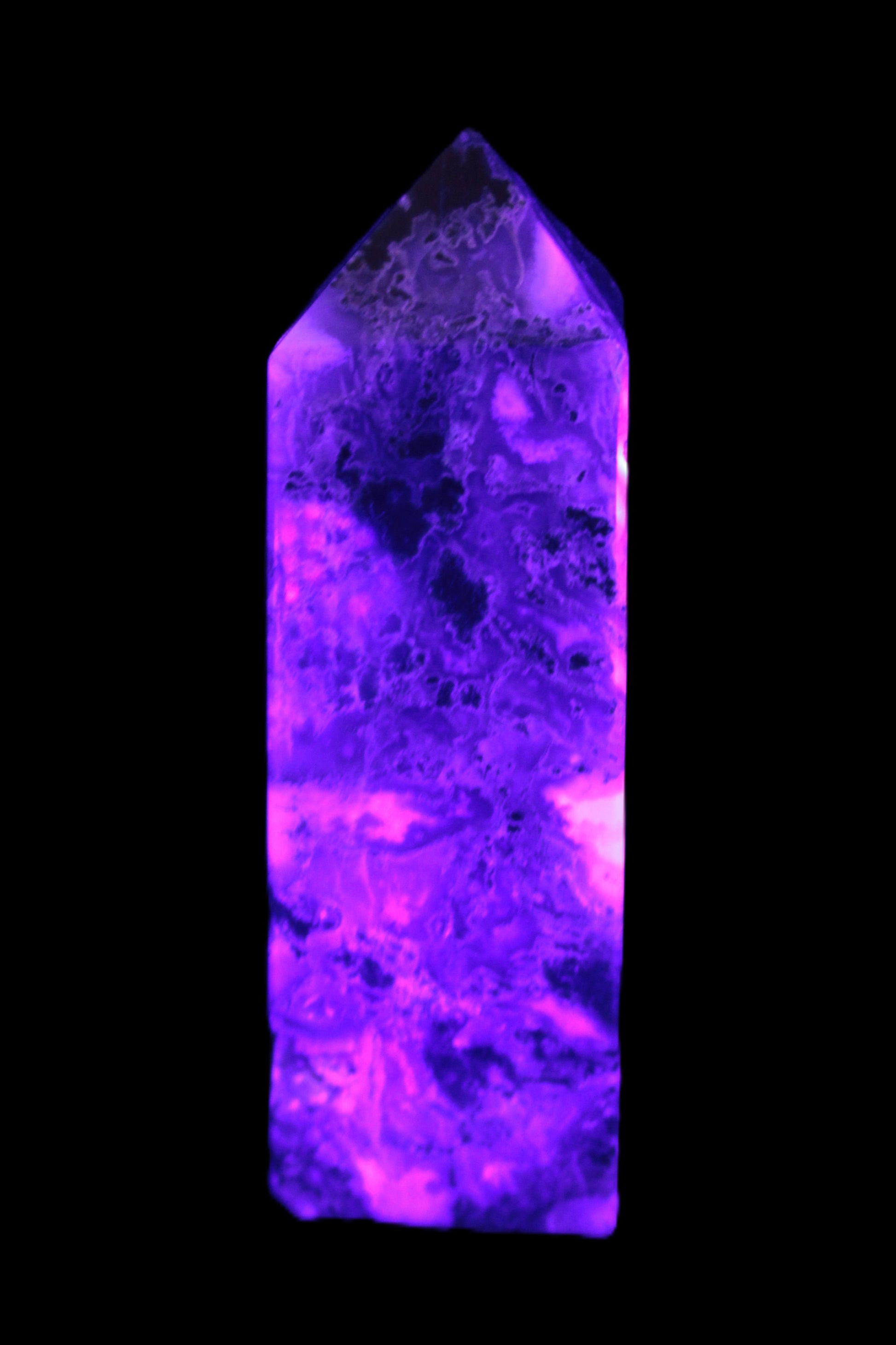 Purple Fantasy Fluorite obelisk 369g in UV light