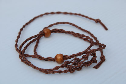 Small brown stone-holder rope cage Rocks and Things