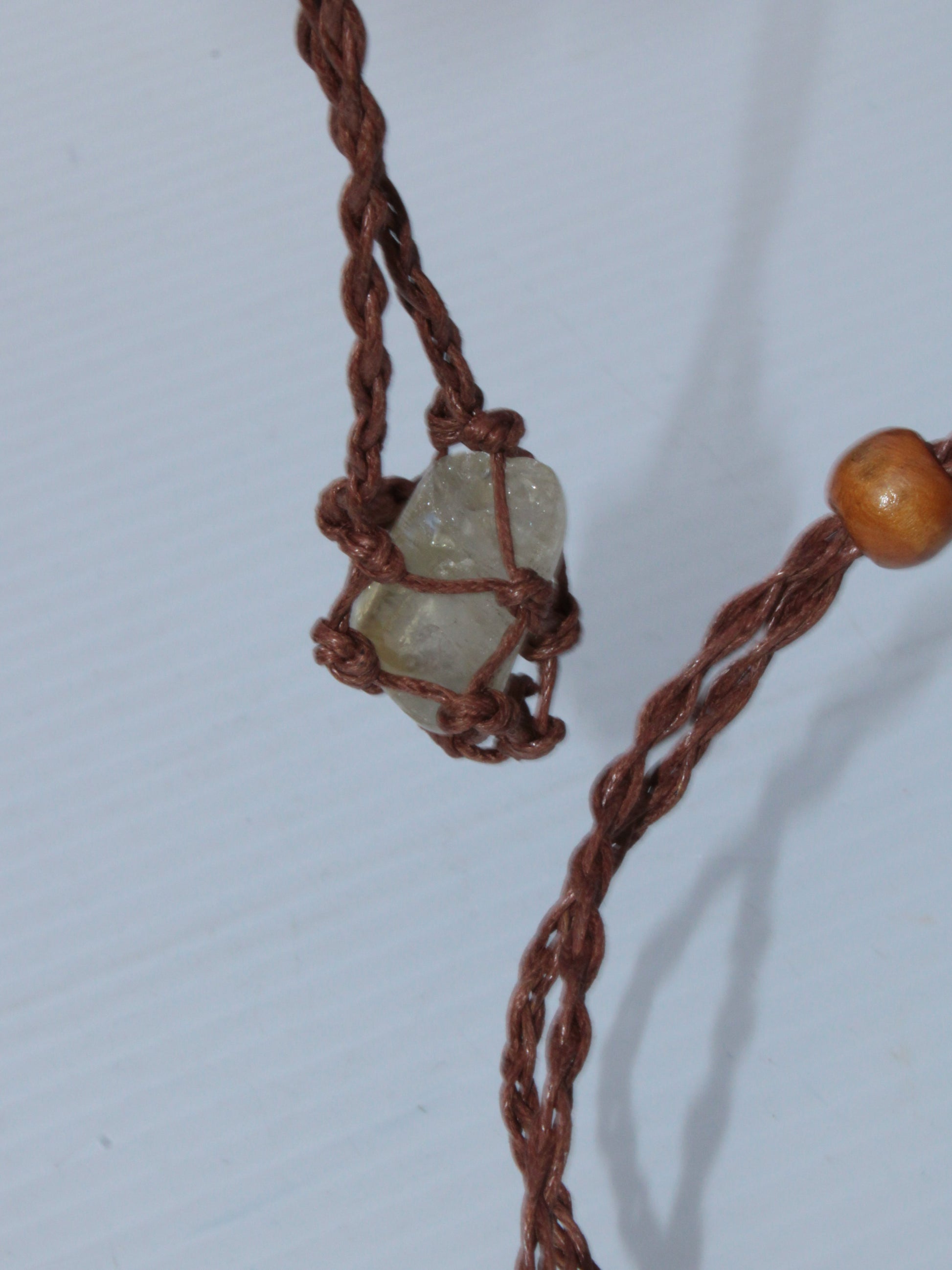 Small brown stone-holder rope cage Rocks and Things