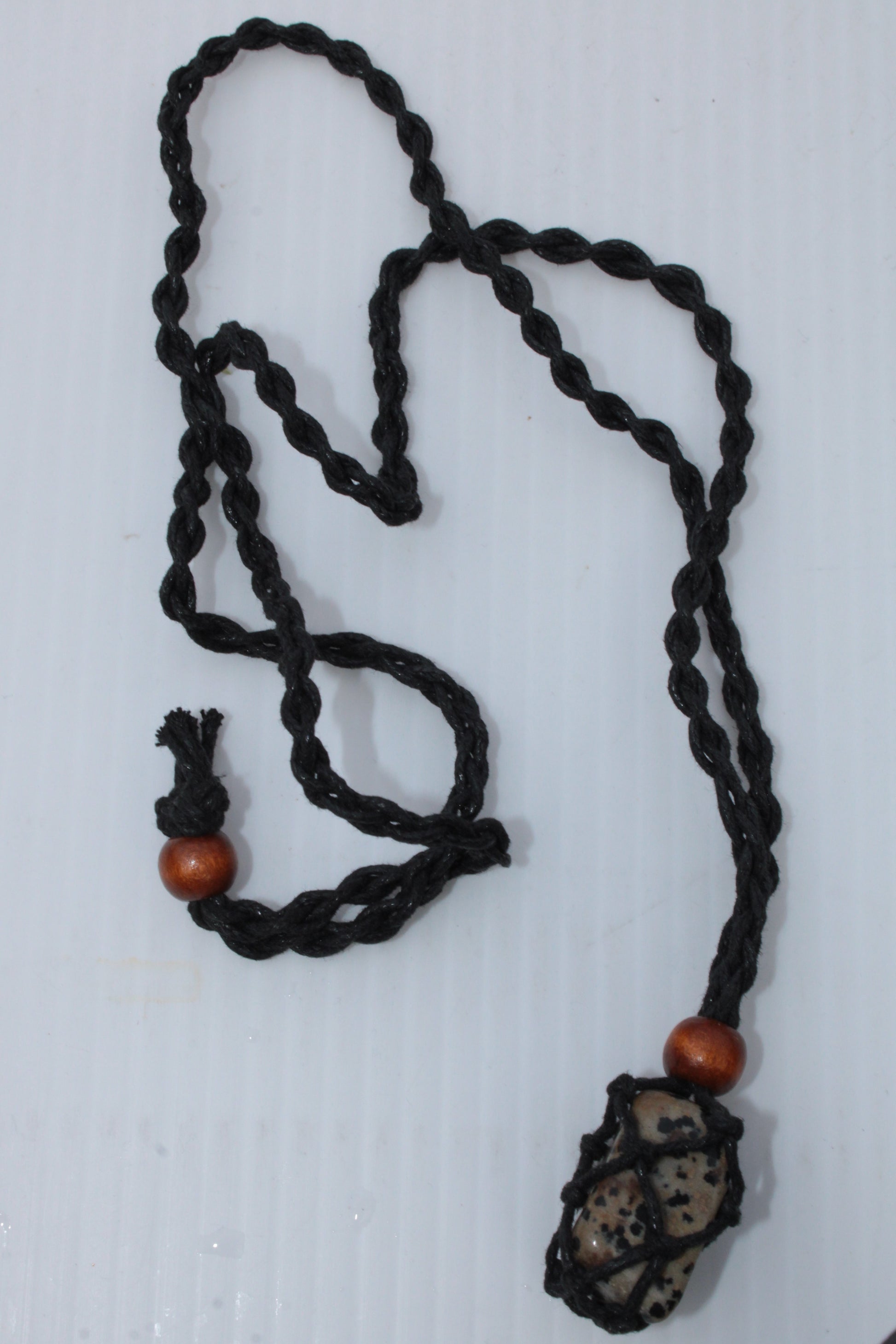 Small black pendant stone-holder rope cage Rocks and Things