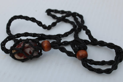 Small black pendant stone-holder rope cage Rocks and Things