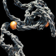 Large black pendant stone-holder rope cage Rocks and Things