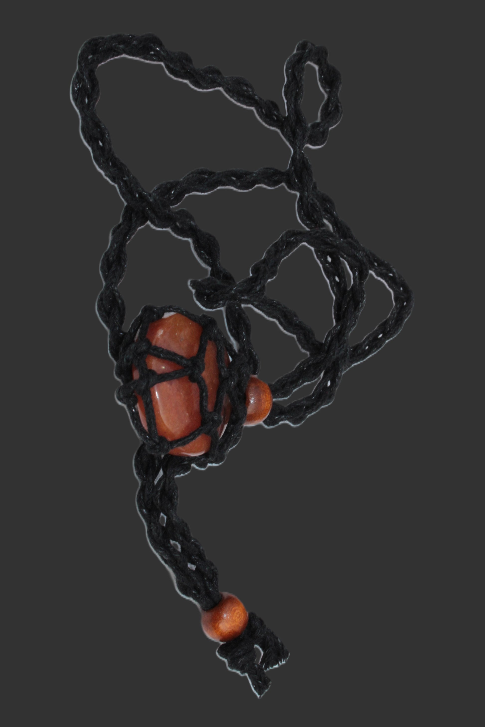 Large black pendant stone-holder rope cage Rocks and Things