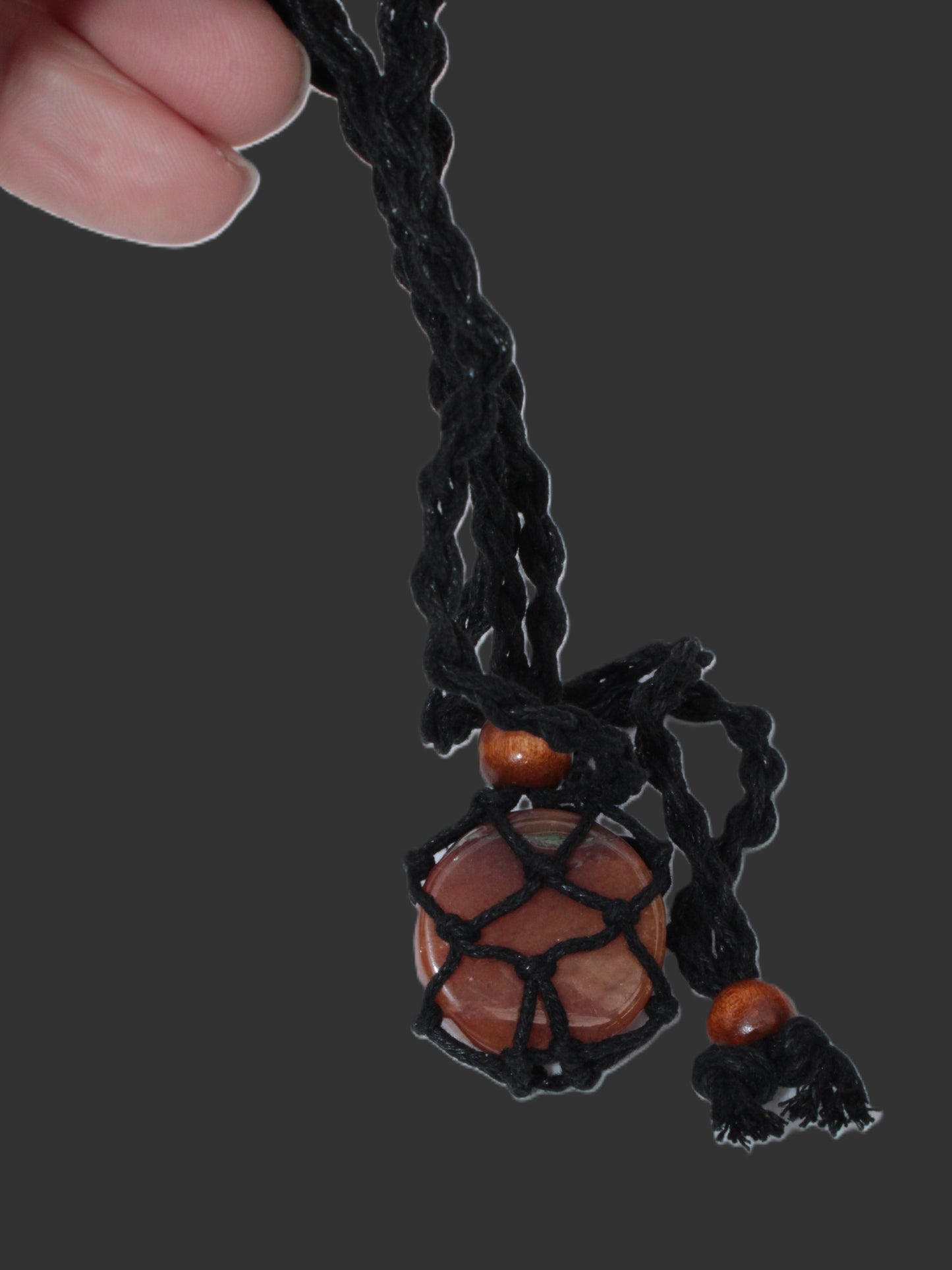 Large black pendant stone-holder rope cage Rocks and Things