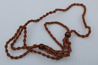 Large brown stone-holder rope cage Rocks and Things