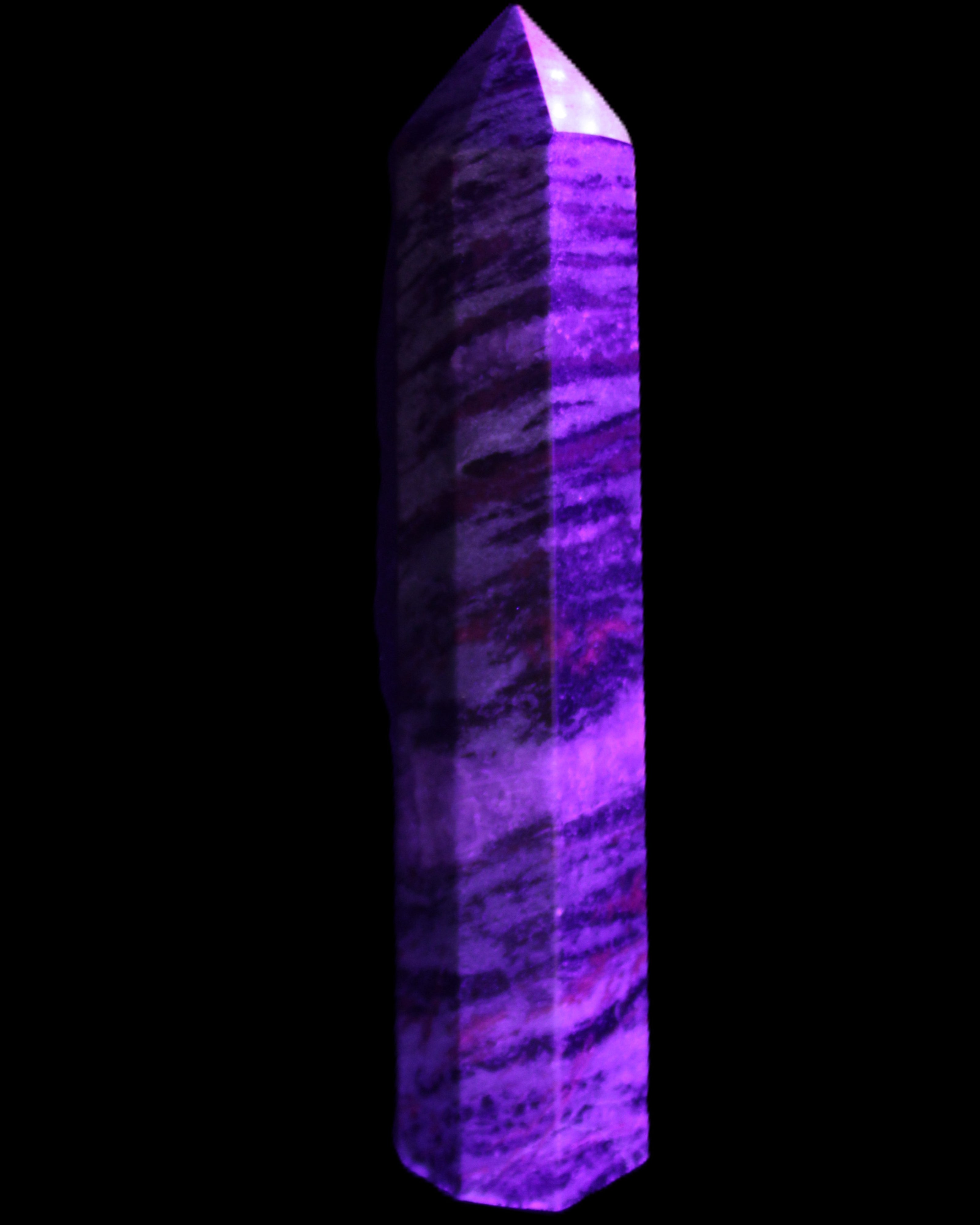 Ruby Zoisite obelisk 574g in UV light - Rocks and Things Store