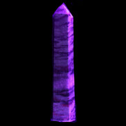 Ruby Zoisite obelisk 574g in UV light - Rocks and Things Store