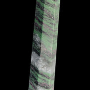 Ruby Zoisite obelisk 574g in sunlight - Rocks and Things Store
