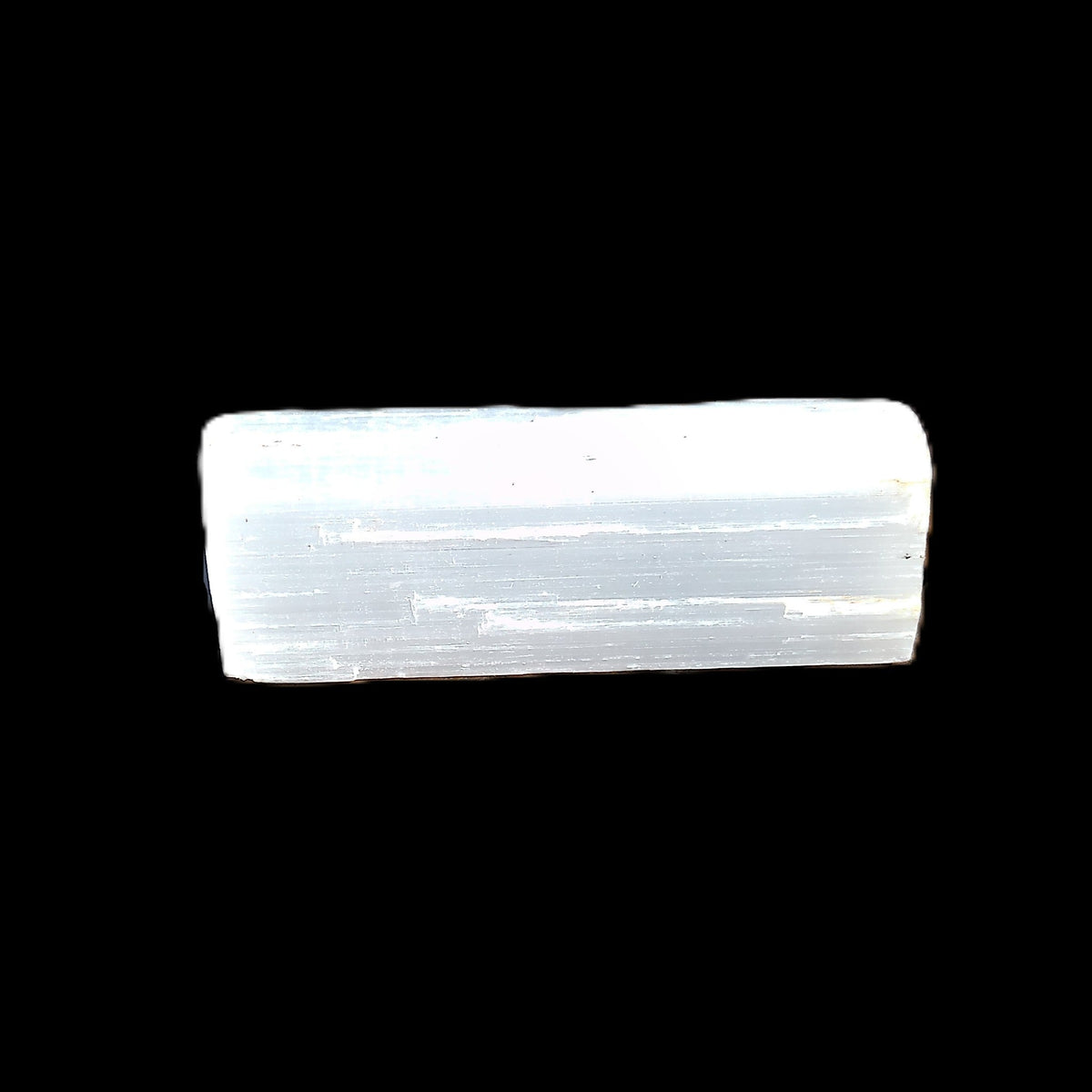Selenite rod 58-62mm 30-39g in sunlight - Rocks and Things Store