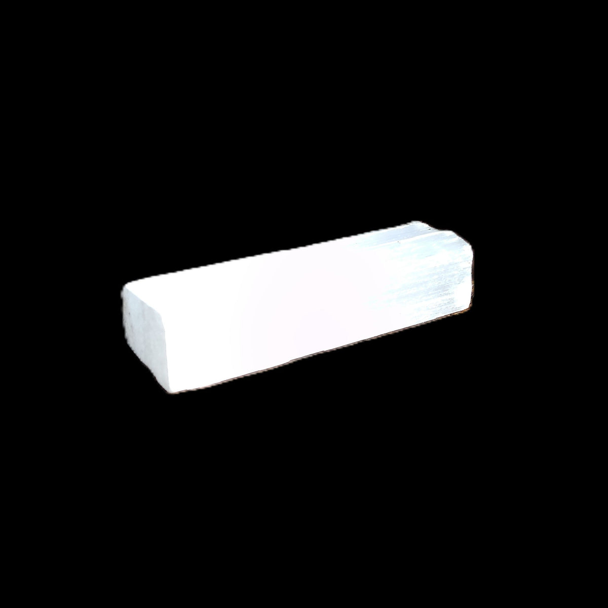 Selenite rod 58-62mm 30-39g in sunlight - Rocks and Things Store