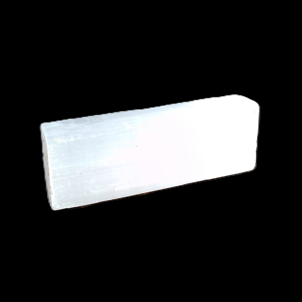 Selenite rod 58-62mm 30-39g in sunlight - Rocks and Things Store