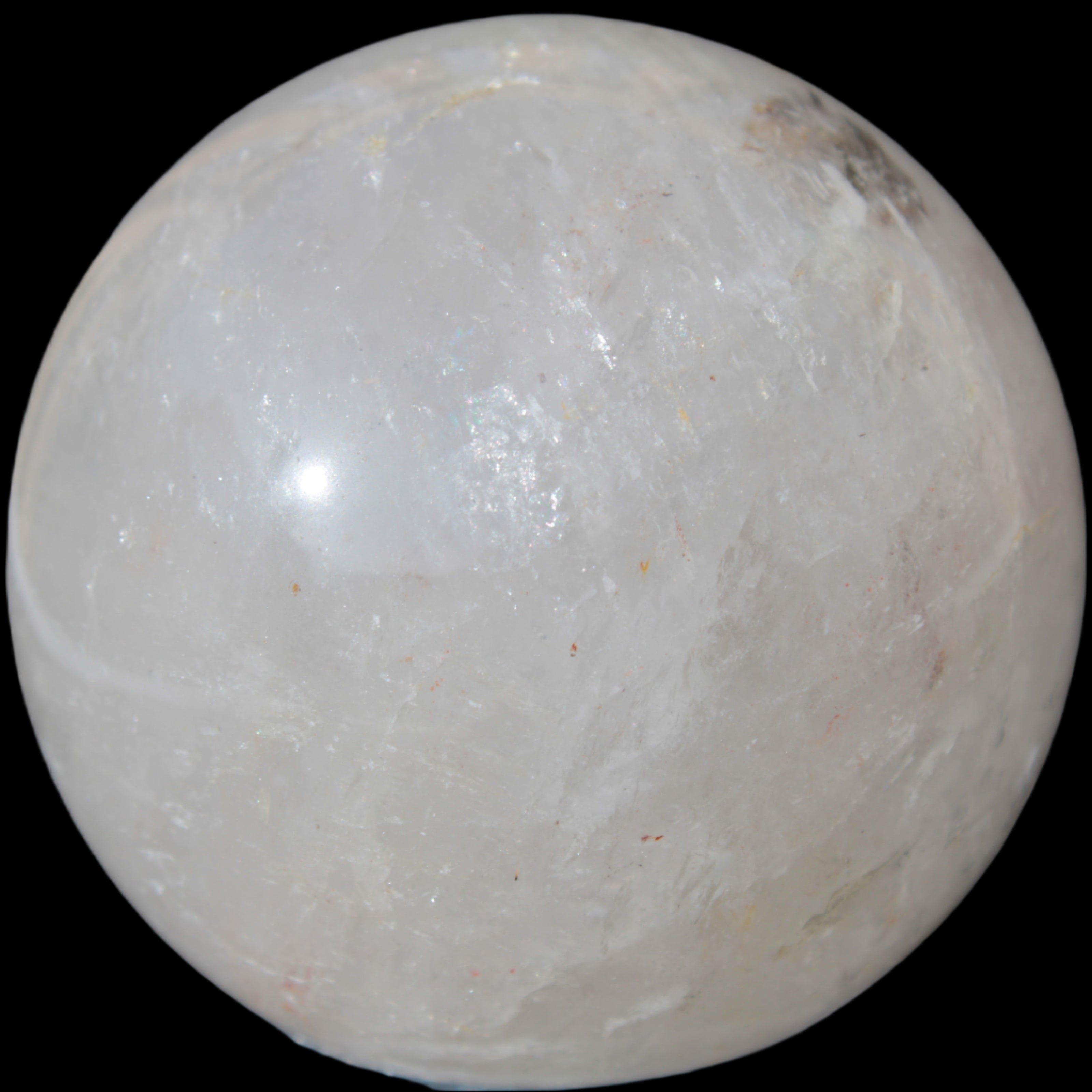 Clear Quartz sphere 70mm 475g in sunlight - Rocks and Things Store