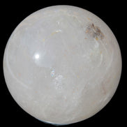 Clear Quartz sphere 70mm 475g in sunlight - Rocks and Things Store