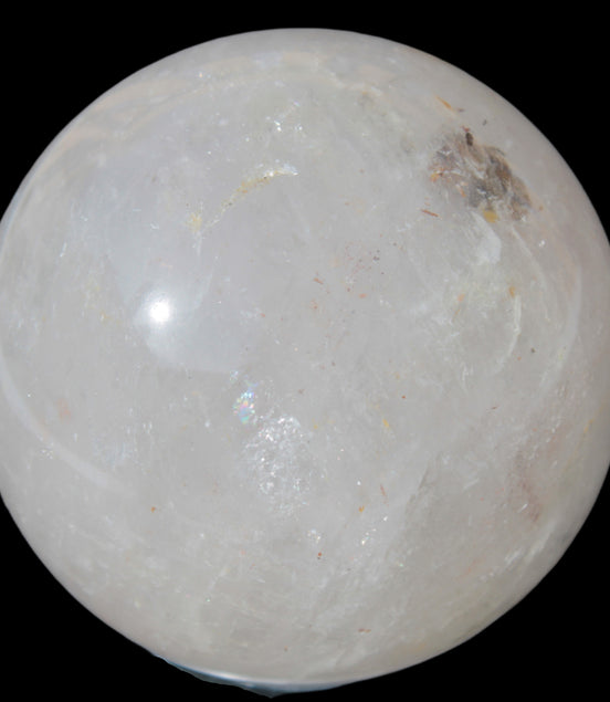 Clear Quartz sphere 70mm 475g in sunlight - Rocks and Things Store