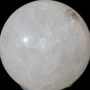 Clear Quartz sphere 70mm 475g in sunlight - Rocks and Things Store
