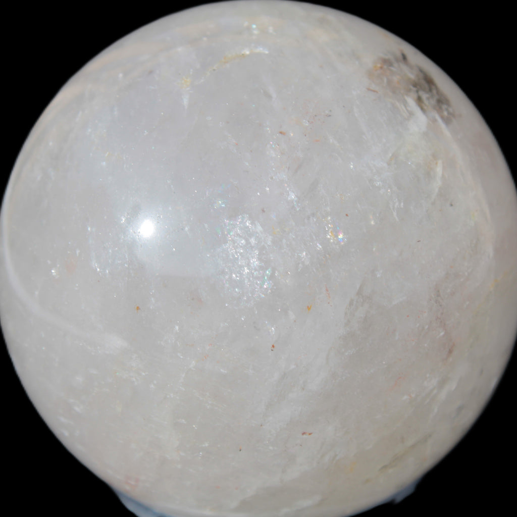 Clear Quartz sphere 70mm 475g in sunlight - Rocks and Things Store