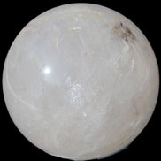 Clear Quartz sphere 70mm 475g in sunlight - Rocks and Things Store