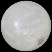 Clear Quartz sphere 70mm 475g in sunlight - Rocks and Things Store